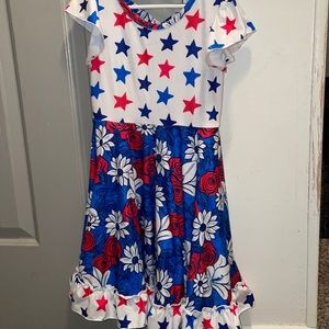 EUC only worn once. Bright twirly Red White & Blue floral/star dress size 6/7